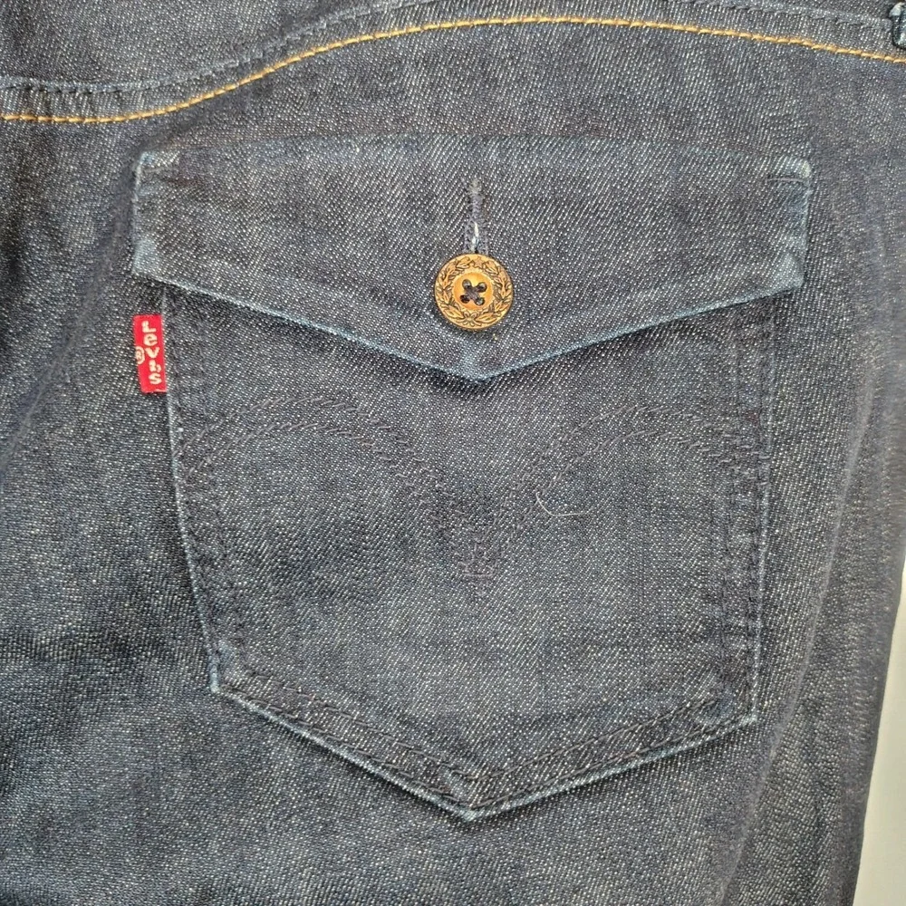 Levis 542 Flare Jeans Women 22M Dark Wash Blue Denim Distressed Hem Mid Rise y2k